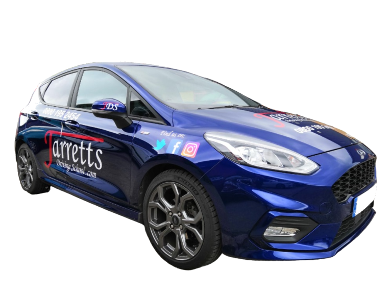 Student learning to drive with OG Driving School