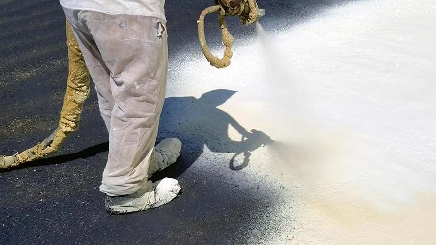 Roof Coatings & Restoration being applied to a North Texas commercial roof
