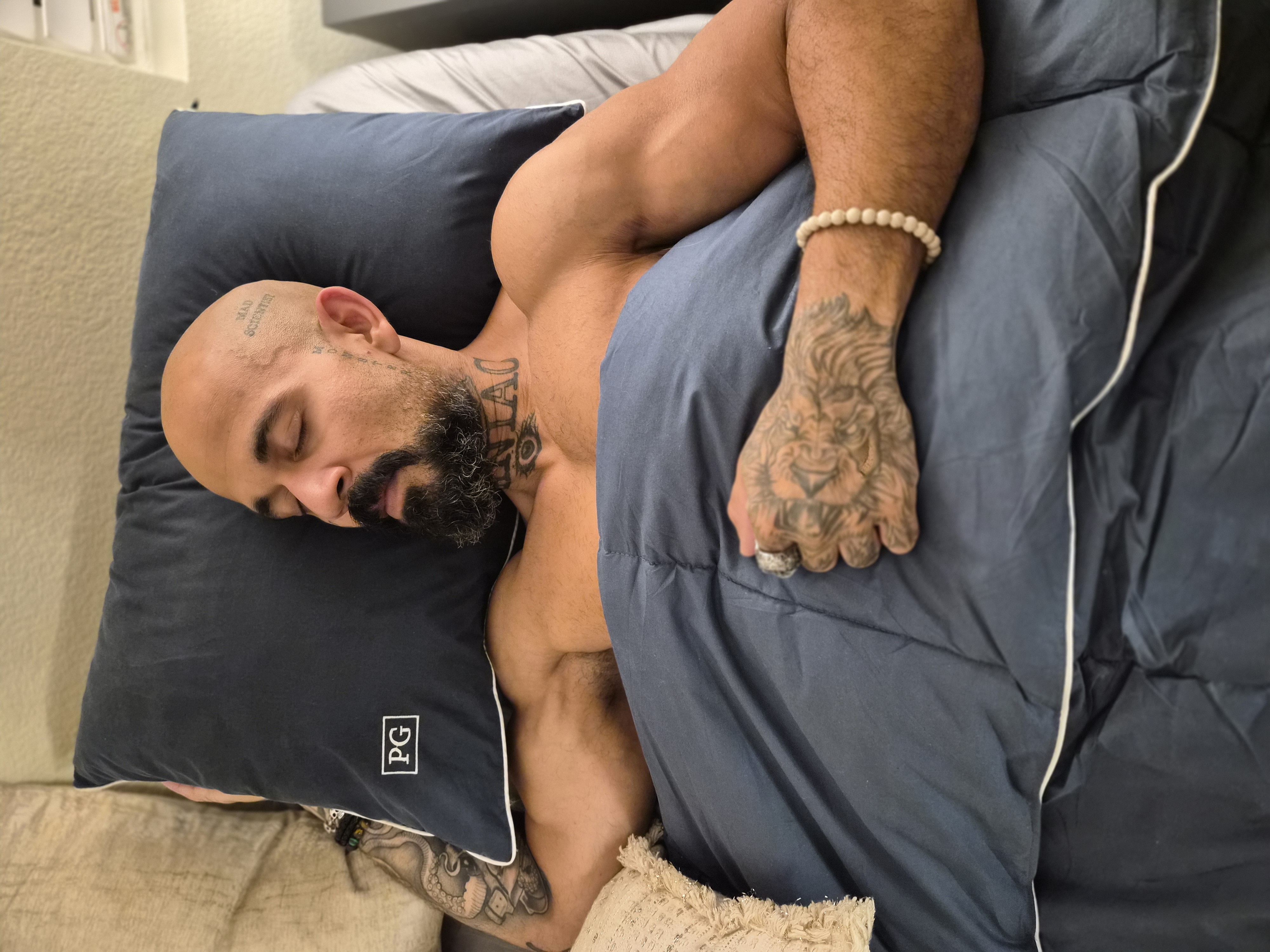 Man sleeping on Pillow Guy pillow