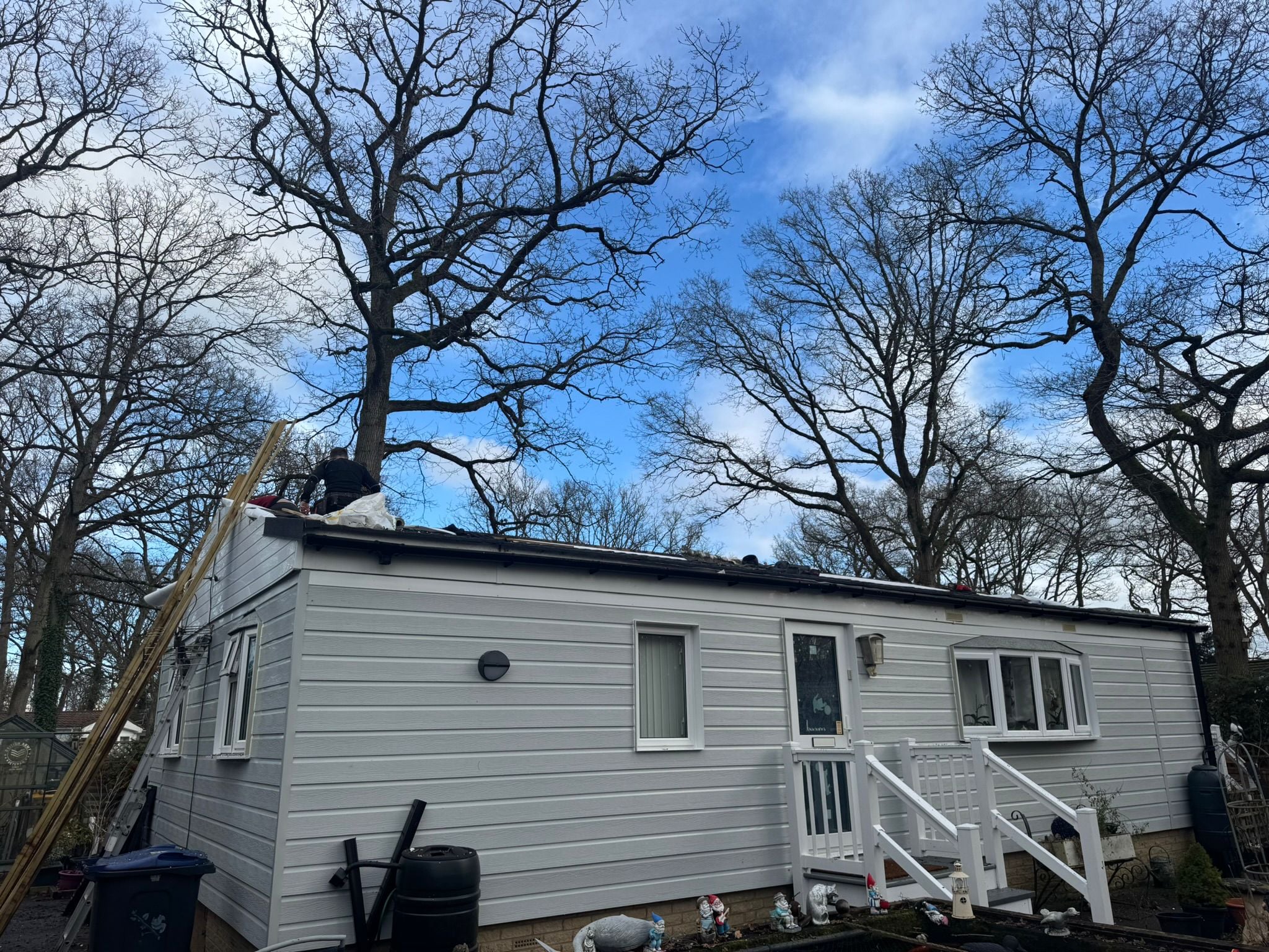 Completed park home exterior with new cladding and roof renovation