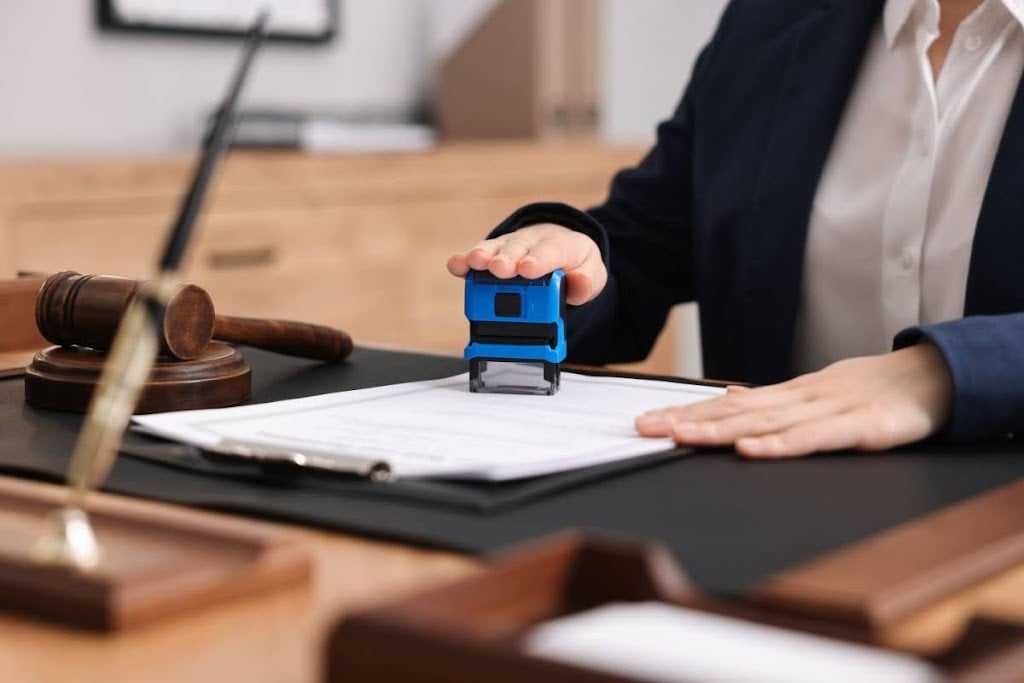 Professional notary public service with documents and official stamp
