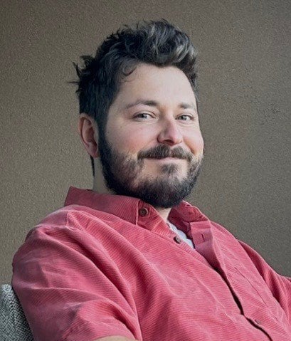 John Houston, Emmy Award winning director and founder of Button Pusher Media