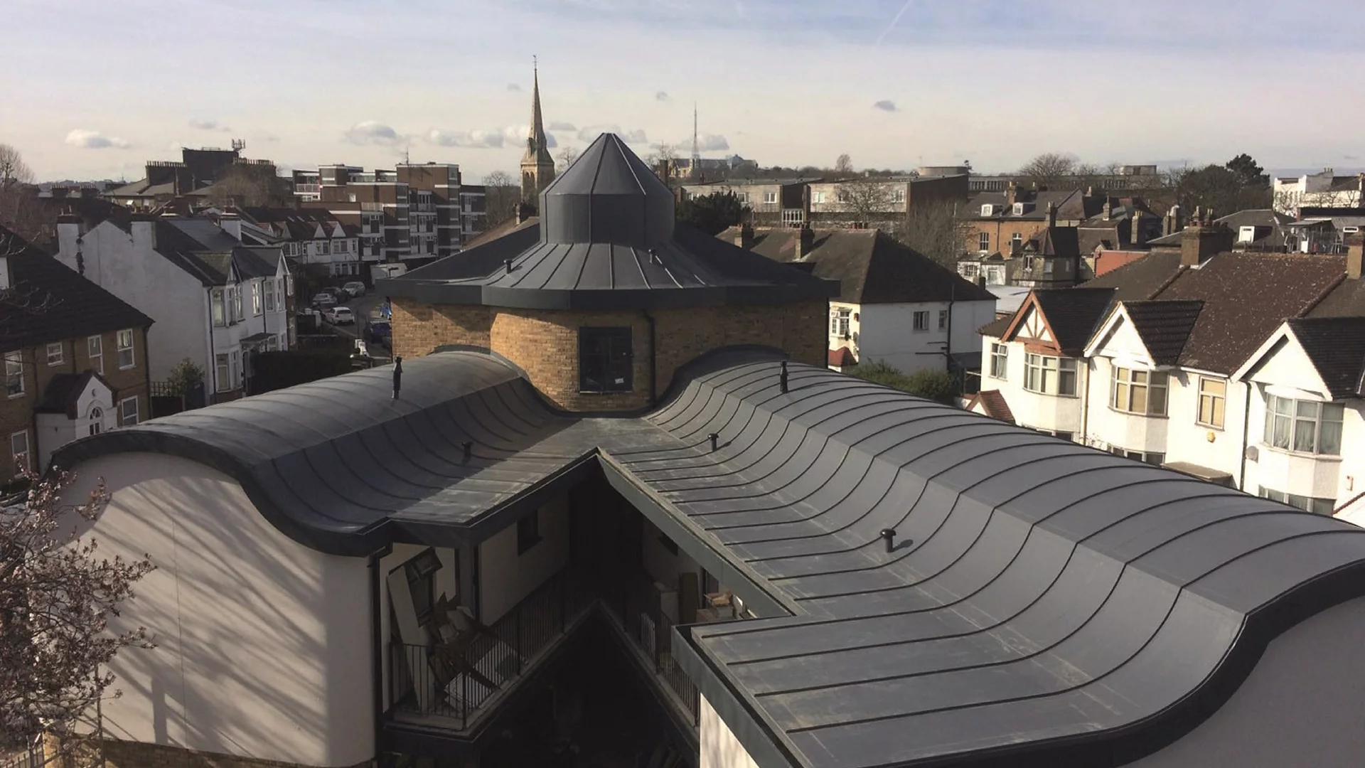 Professional roofers working on UK house roof in Chester