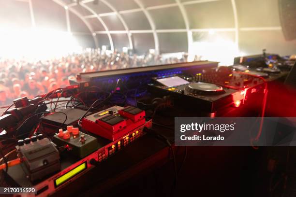 Music festival crowd and DJ setup