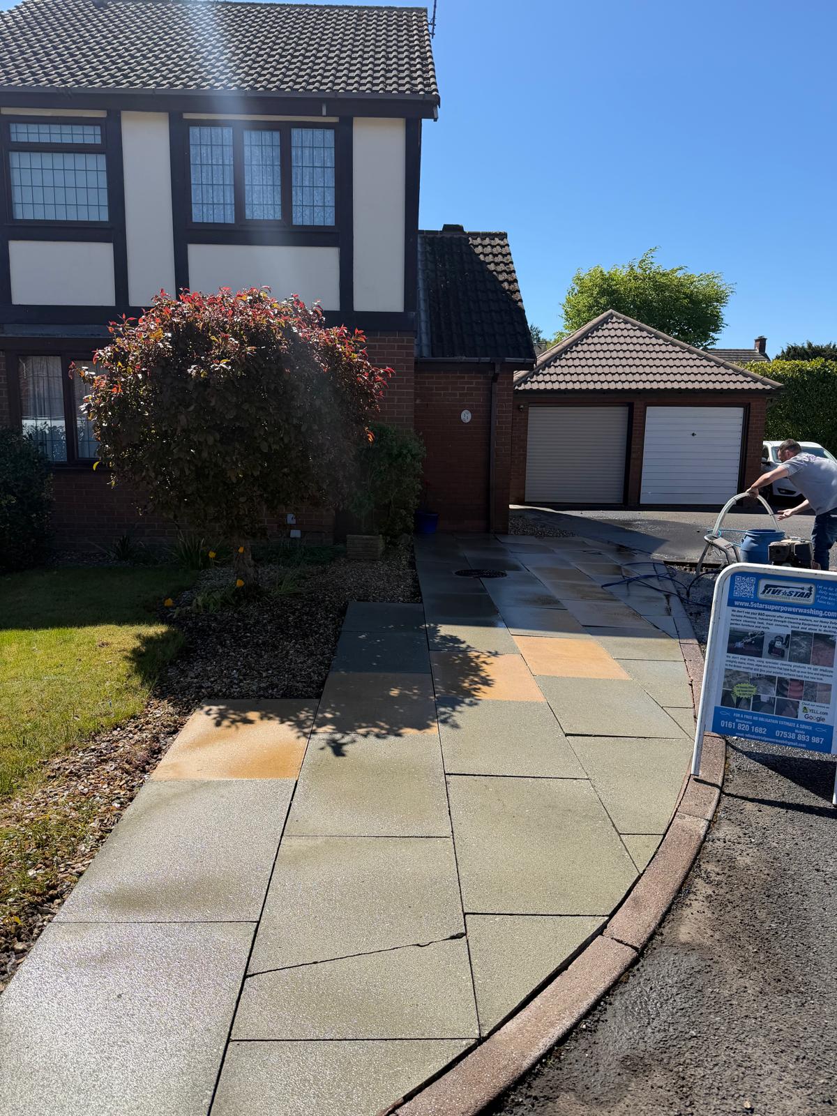 Driveway before cleaning - stained and weathered with algae