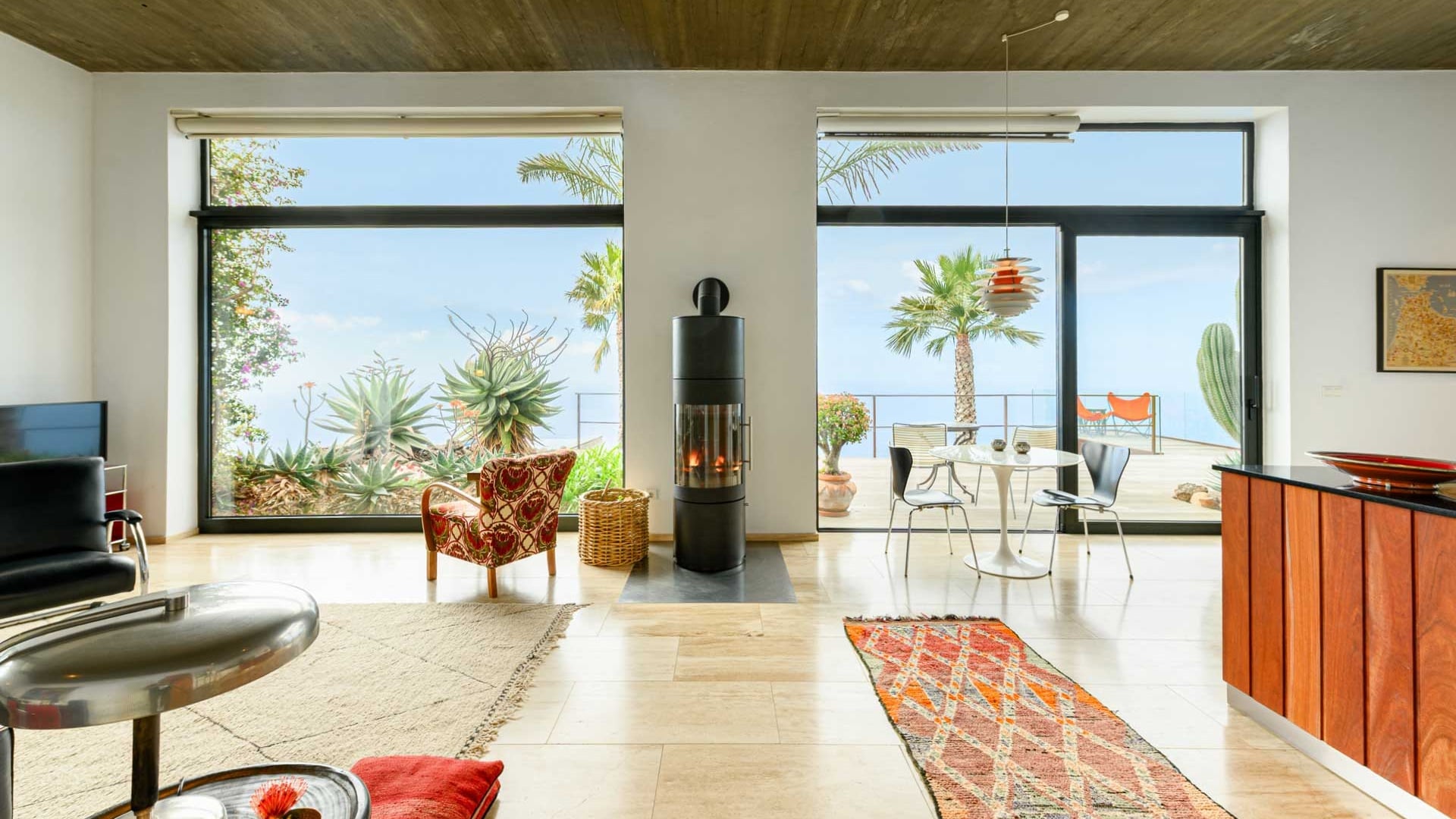 Villa interior with vintage furnishings and global art