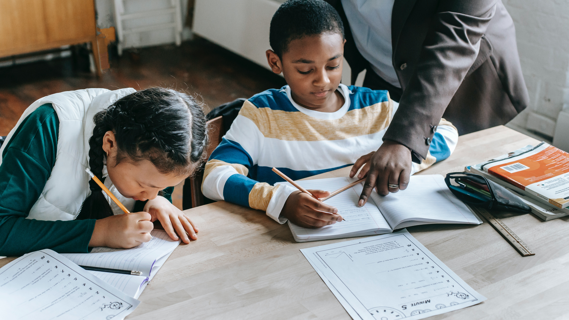 One-to-one maths tutoring session with a tutor helping a student