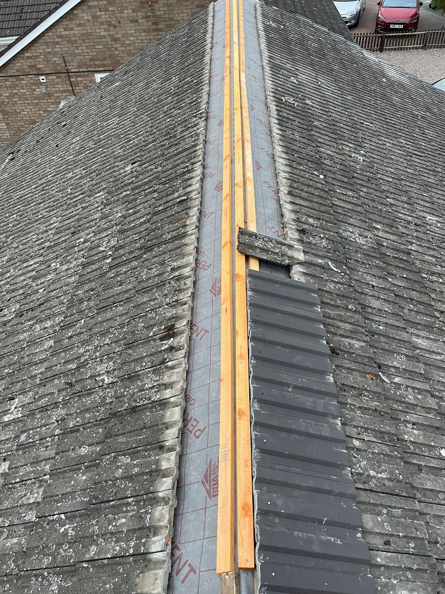 Roof repair work in progress showing expert craftsmanship