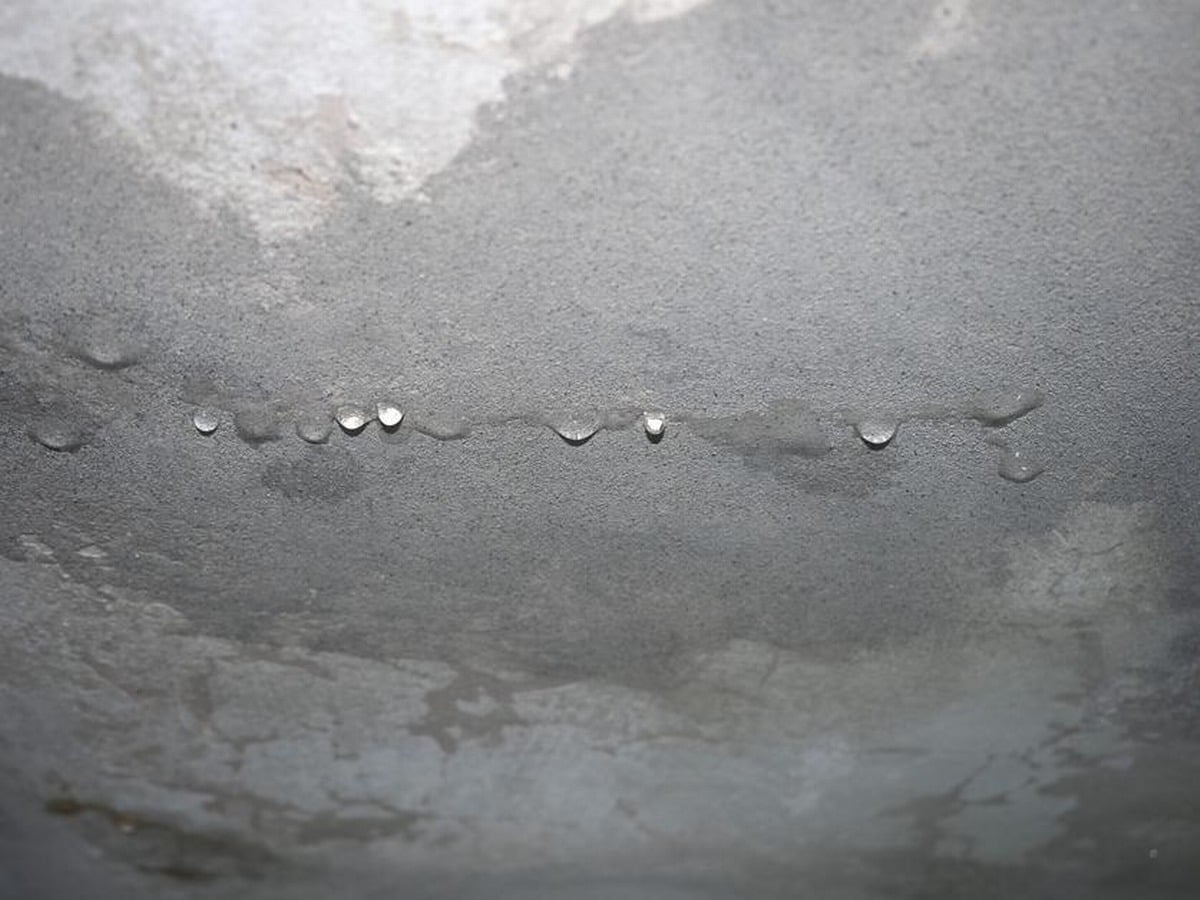 Water dripping from ceiling leak