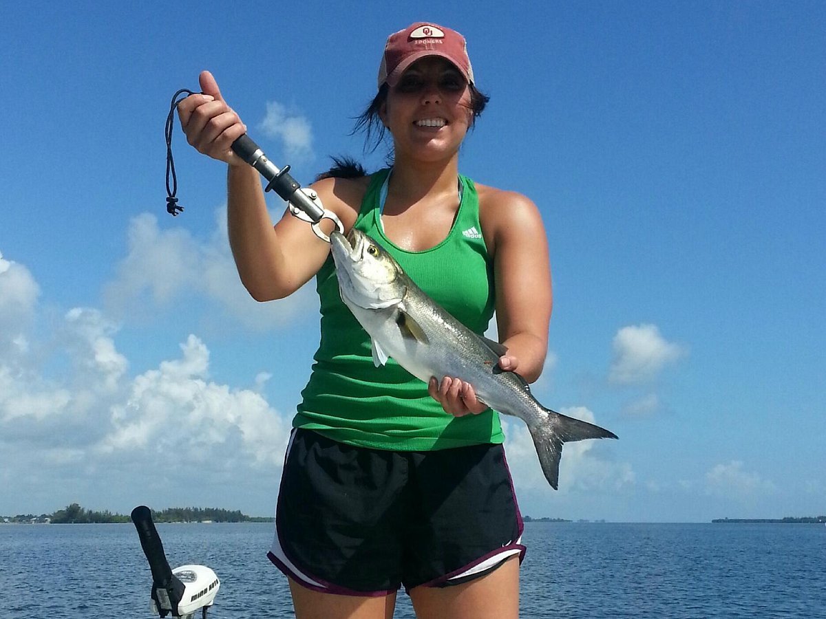 Captain helping tourists