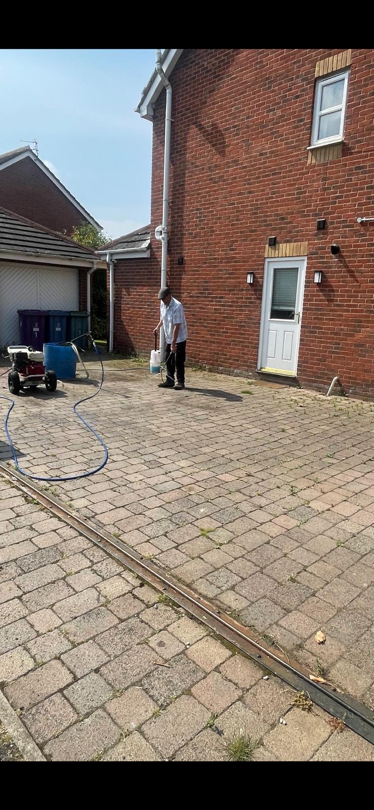 Residential UK property with freshly cleaned exterior and driveway
