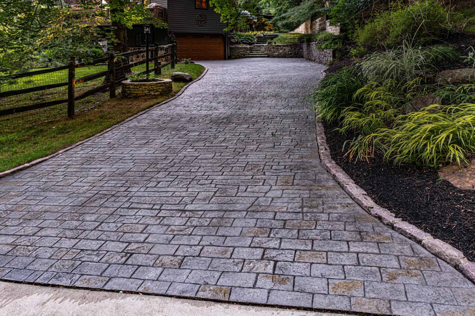 Decorative stamped concrete driveway installation
