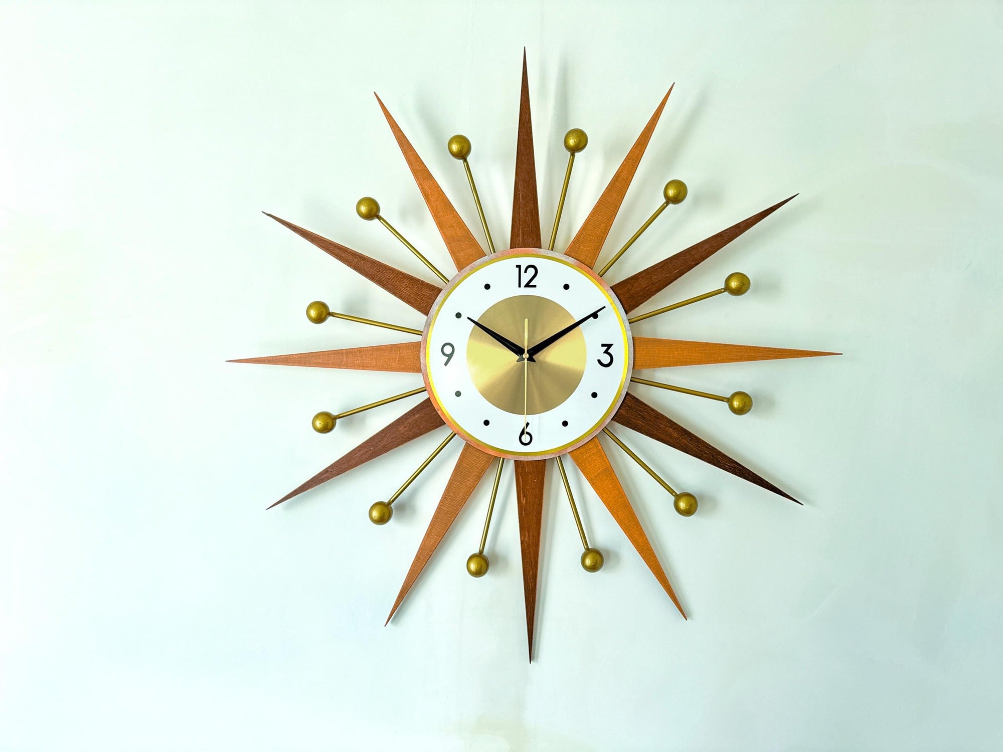 Starburst Wall Clock in Brass