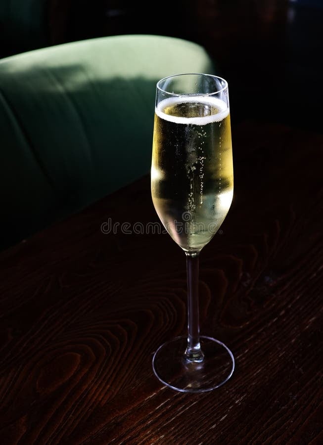 Elegant sparkling wine being poured into a flute glass
