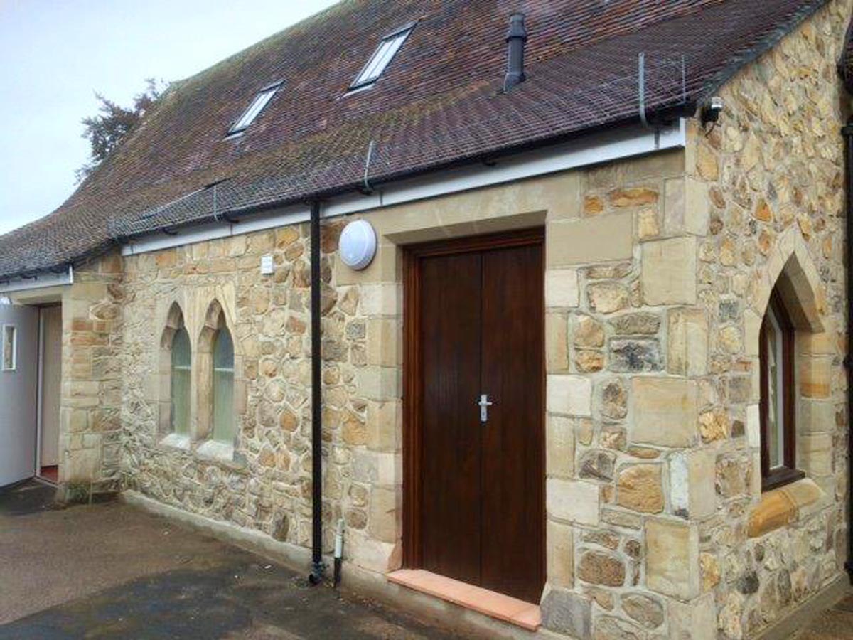 Restored sandstone building after cleaning