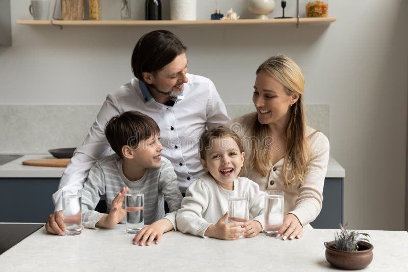Happy San Antonio family enjoying clean, soft water in their home