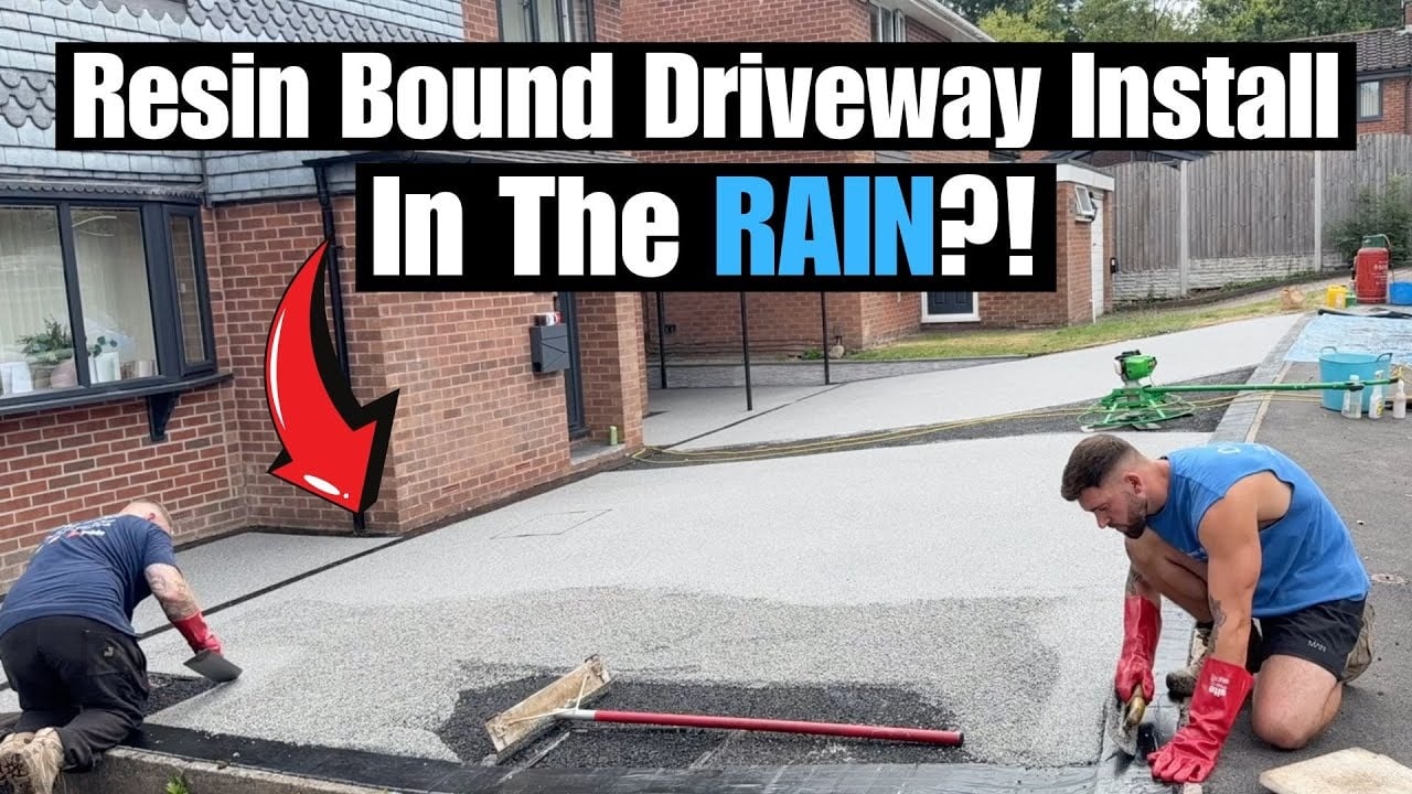 Professional team installing a resin bound driveway surface