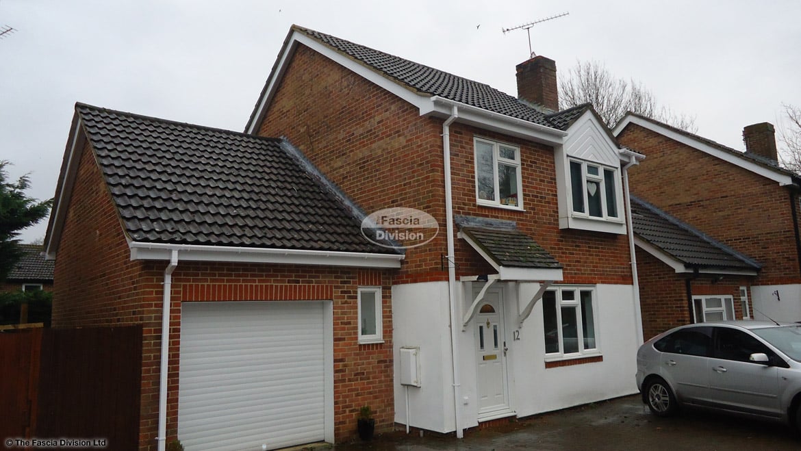 Black gutters with white fascias on UK house