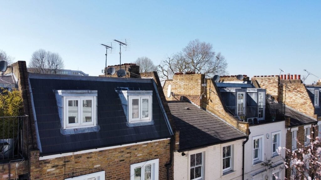 New slate roof installation on UK terraced house