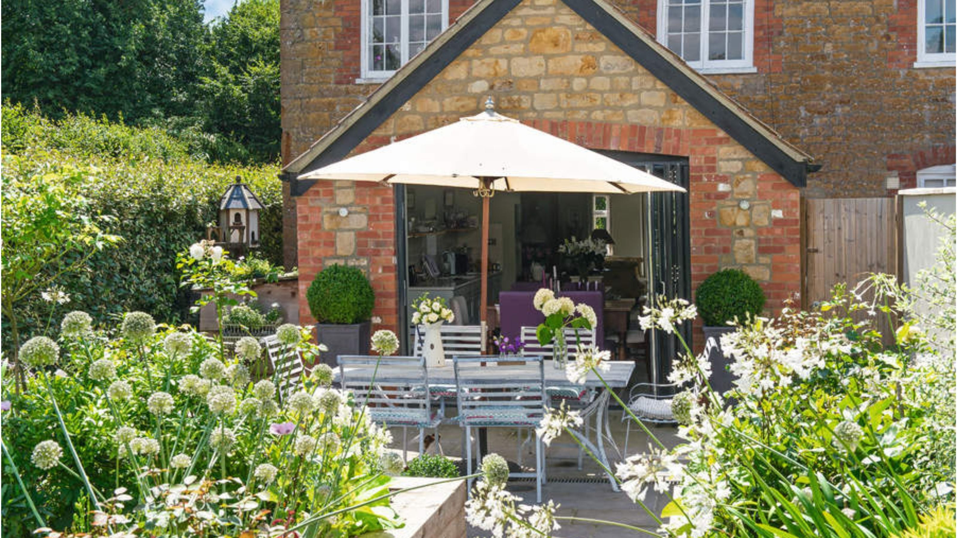 Garden patio with seating area – Heaton Moor