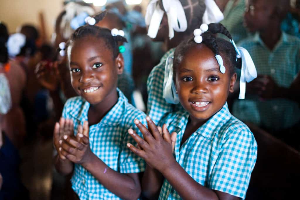 Smiling Haitian children in a school setting