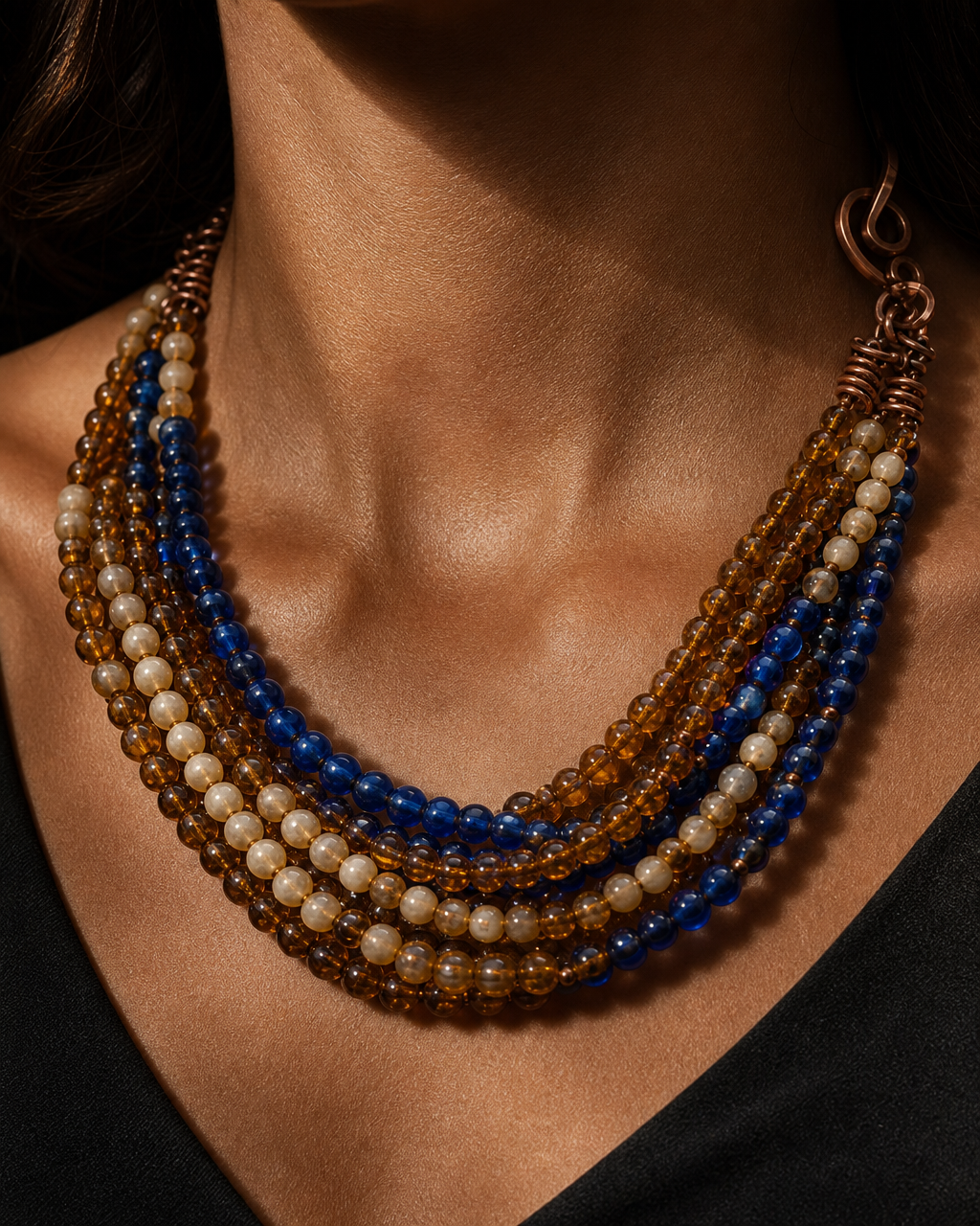 Close-up of the Lalibela Strand on a model's neck