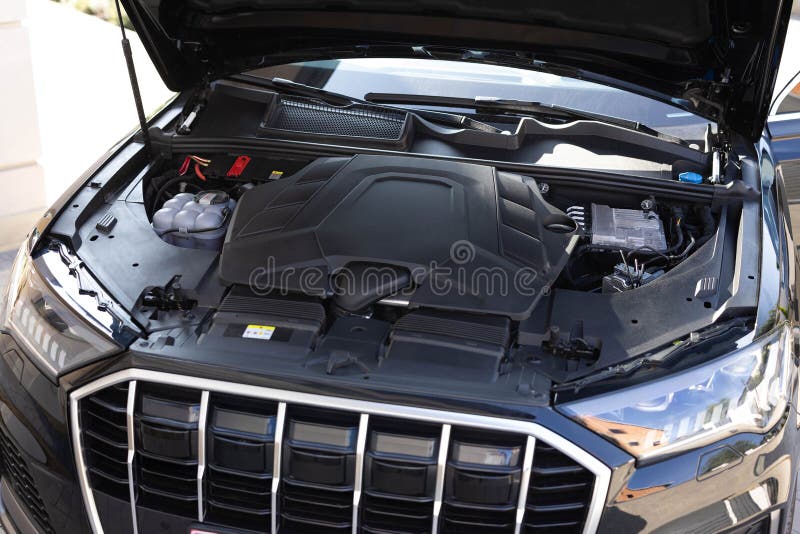 Hybrid vehicle engine bay components