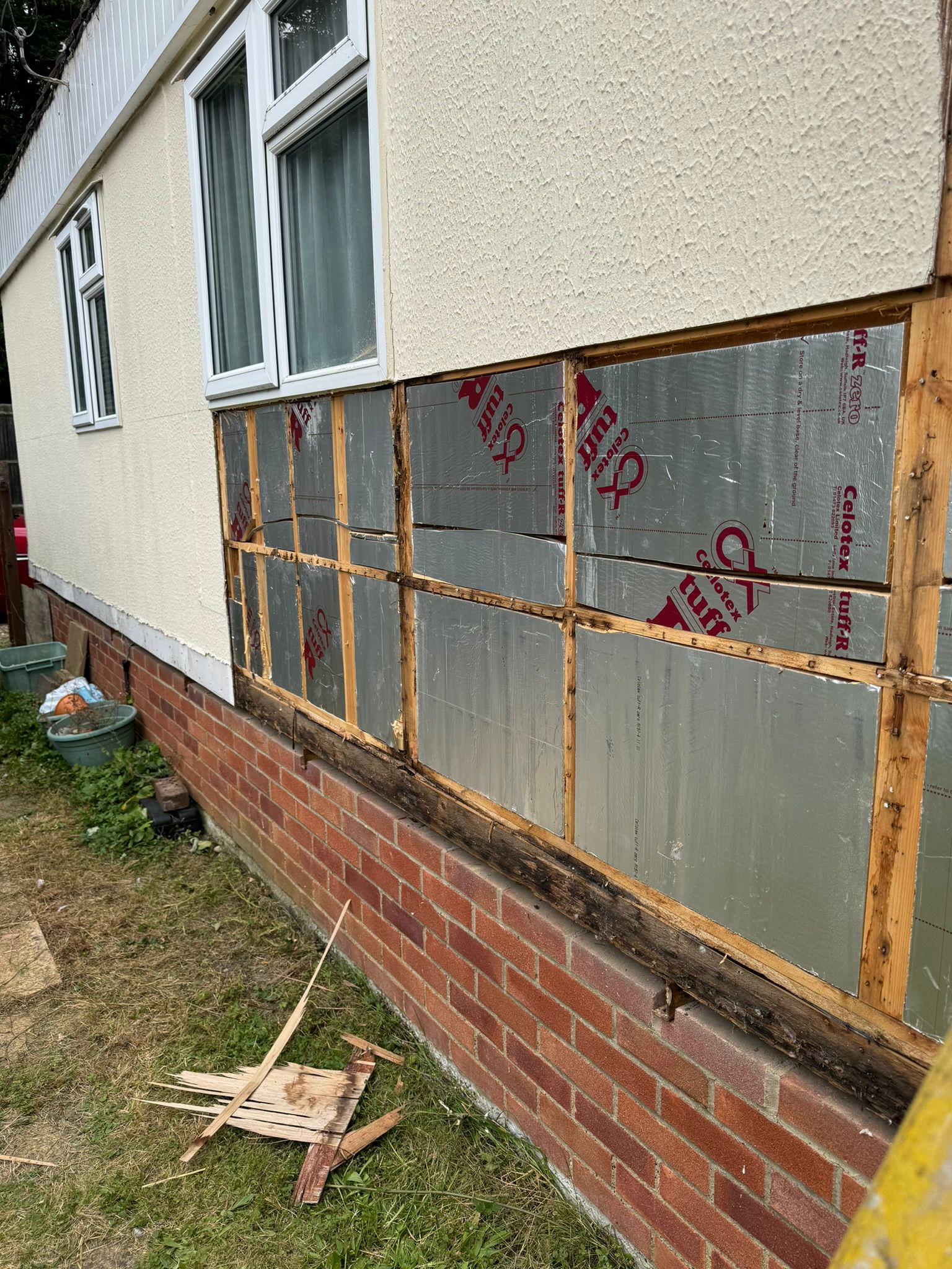 Full wall of Celotex insulation boards installed in timber frame on park home exterior