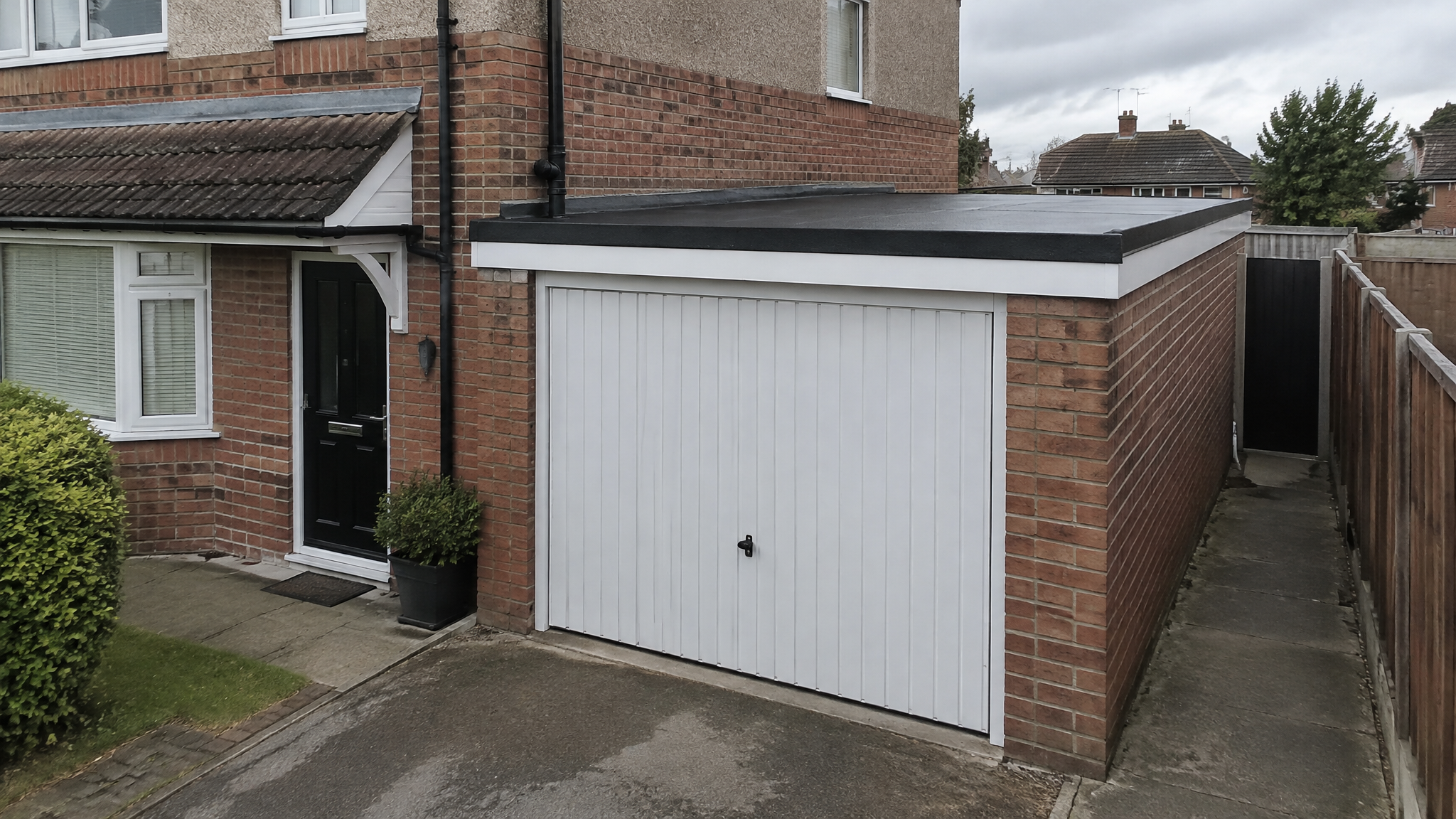 UK garage with new felt flat roof