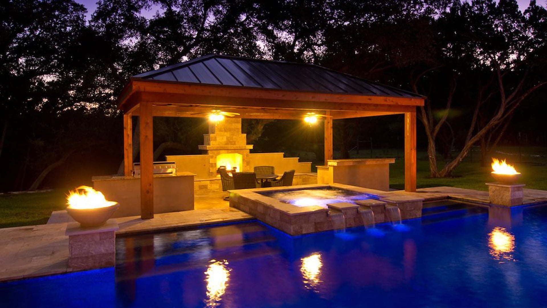 Modern geometric pool with LED lighting at night