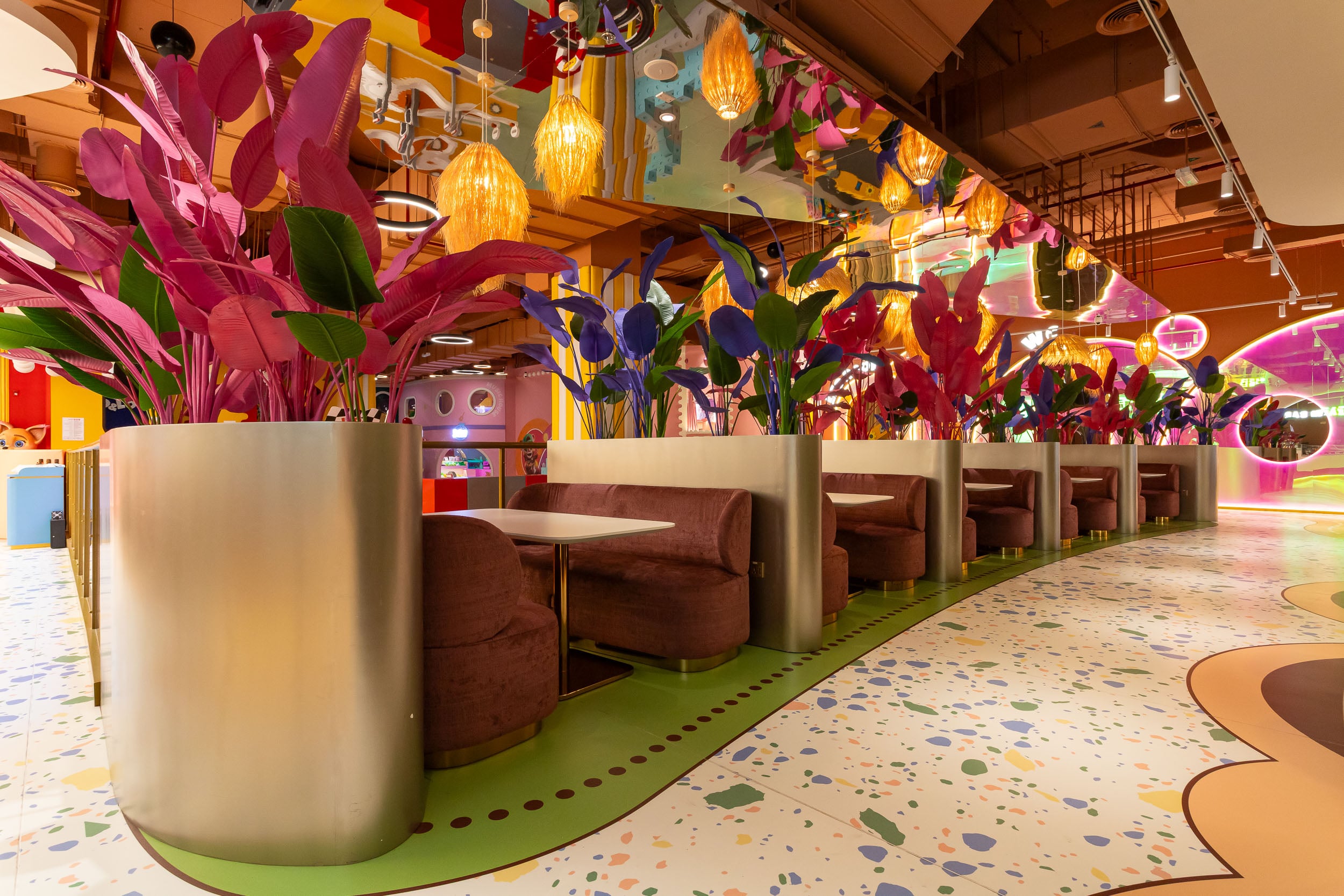 Premium family entertainment venue with designer decor and immersive environment