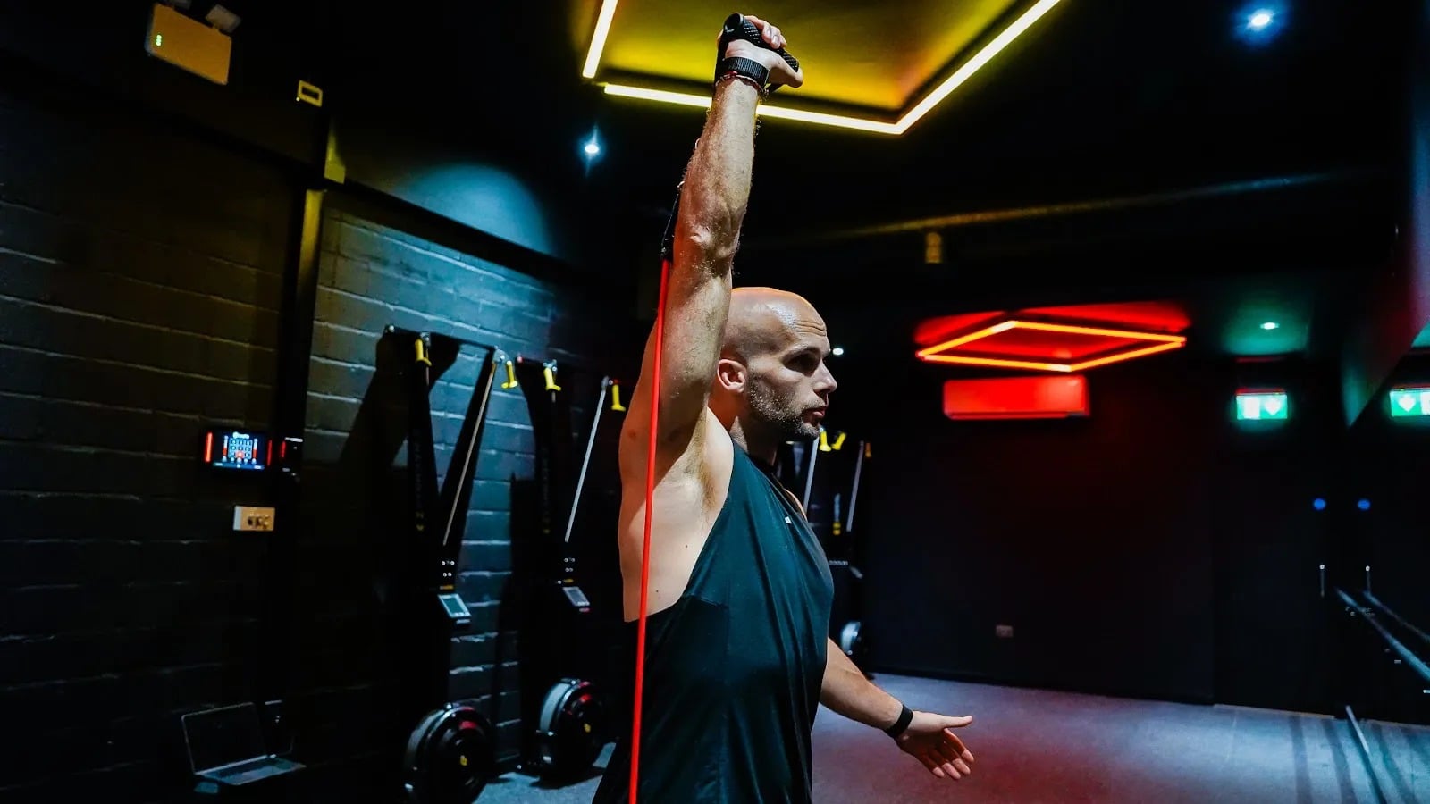 LowFlo fitness studio interior with moody lighting