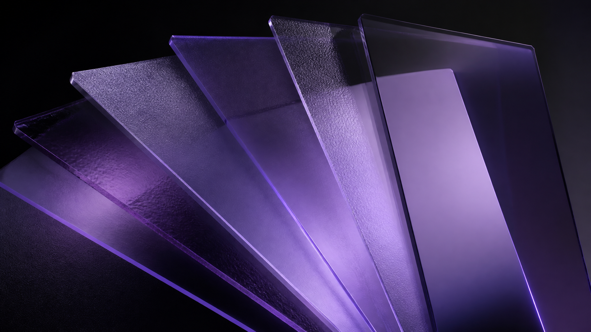 Layered translucent panels of varying finishes in dark violet frosted glass, fanned out like a set of material choices, with soft violet glow between them, representing a range of custom door finishes presented simply