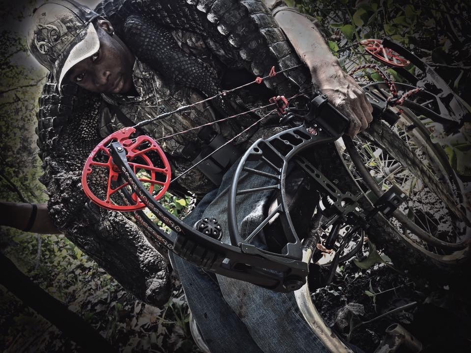 Joshua Carney bow hunting alligator in the southern swamps