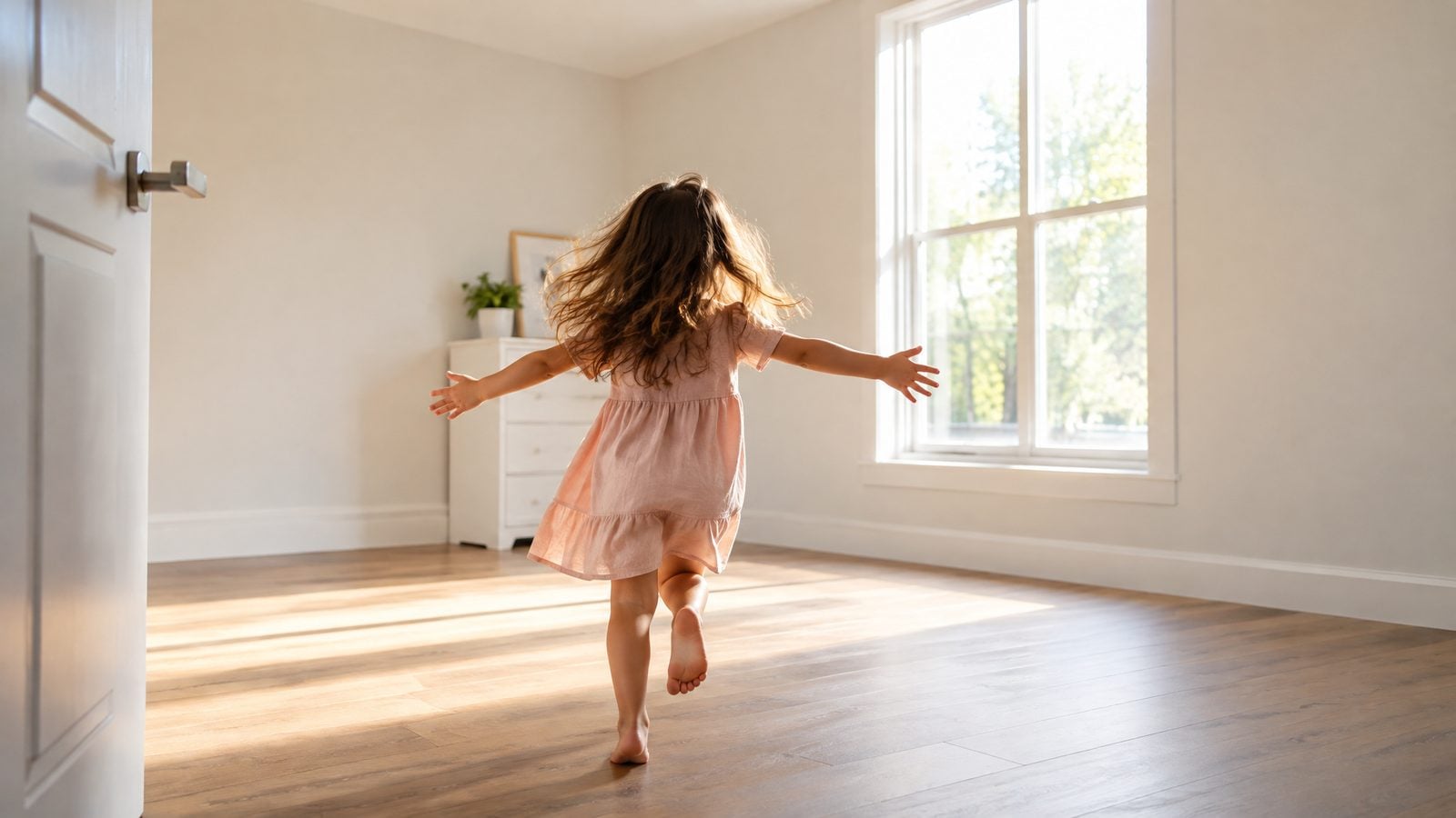 Child exploring a sunlit bedroom in a new home — Appleton, Wisconsin