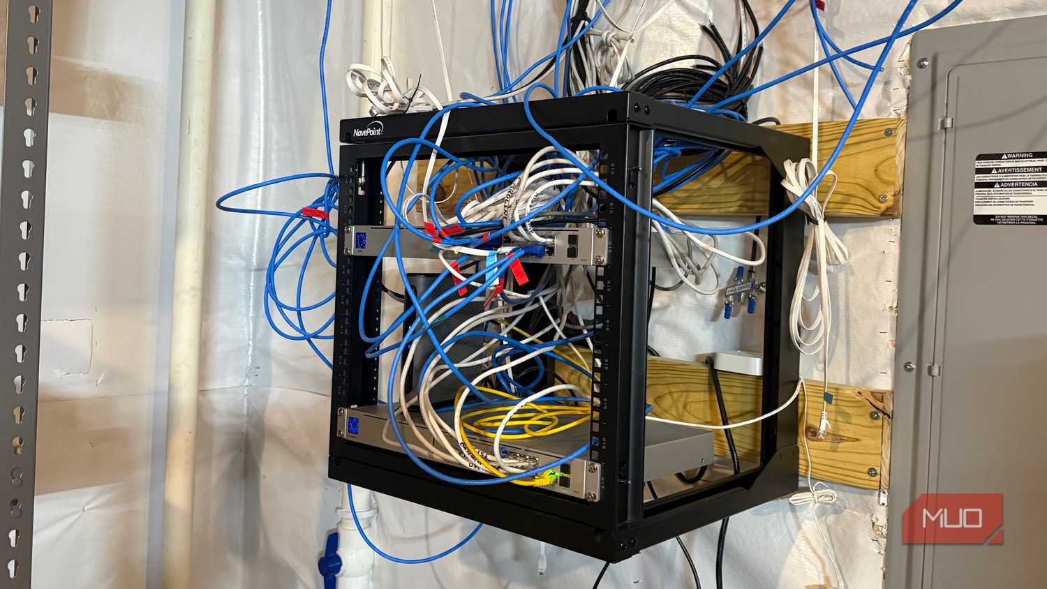 Messy tangled network cables before professional cleanup