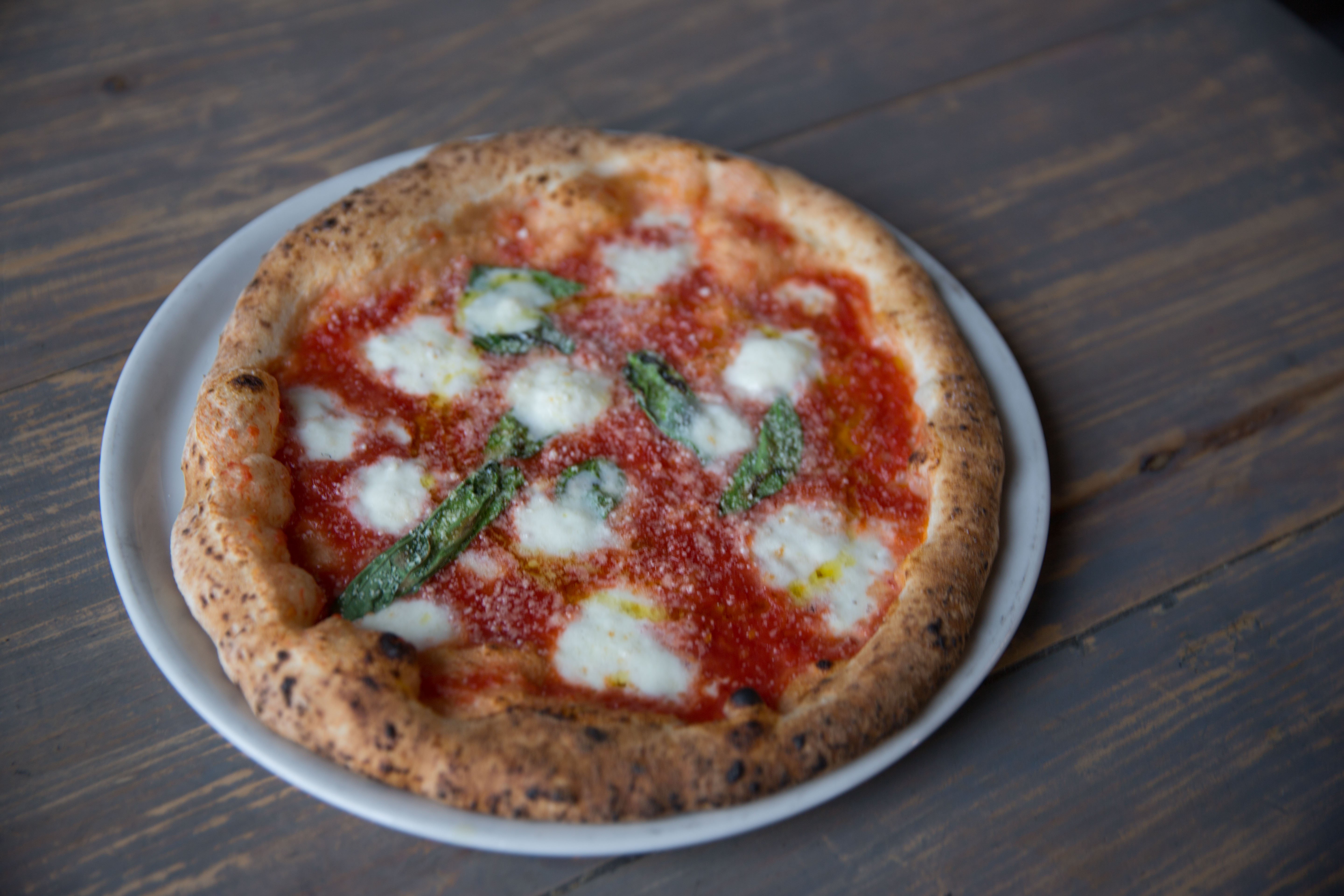 Premium Italian ingredients - fior di latte mozzarella, fresh plum peeled tomatoes, fresh basil