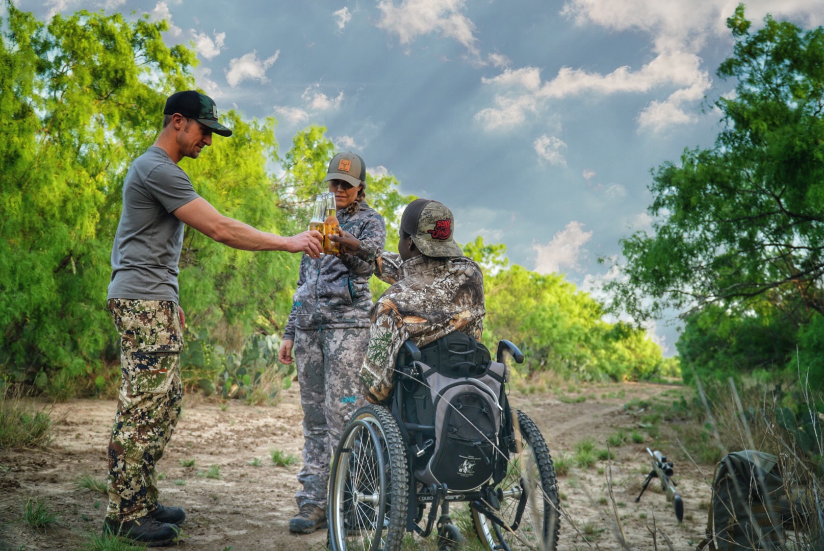 Joshua and hunting partners celebrating after a successful day