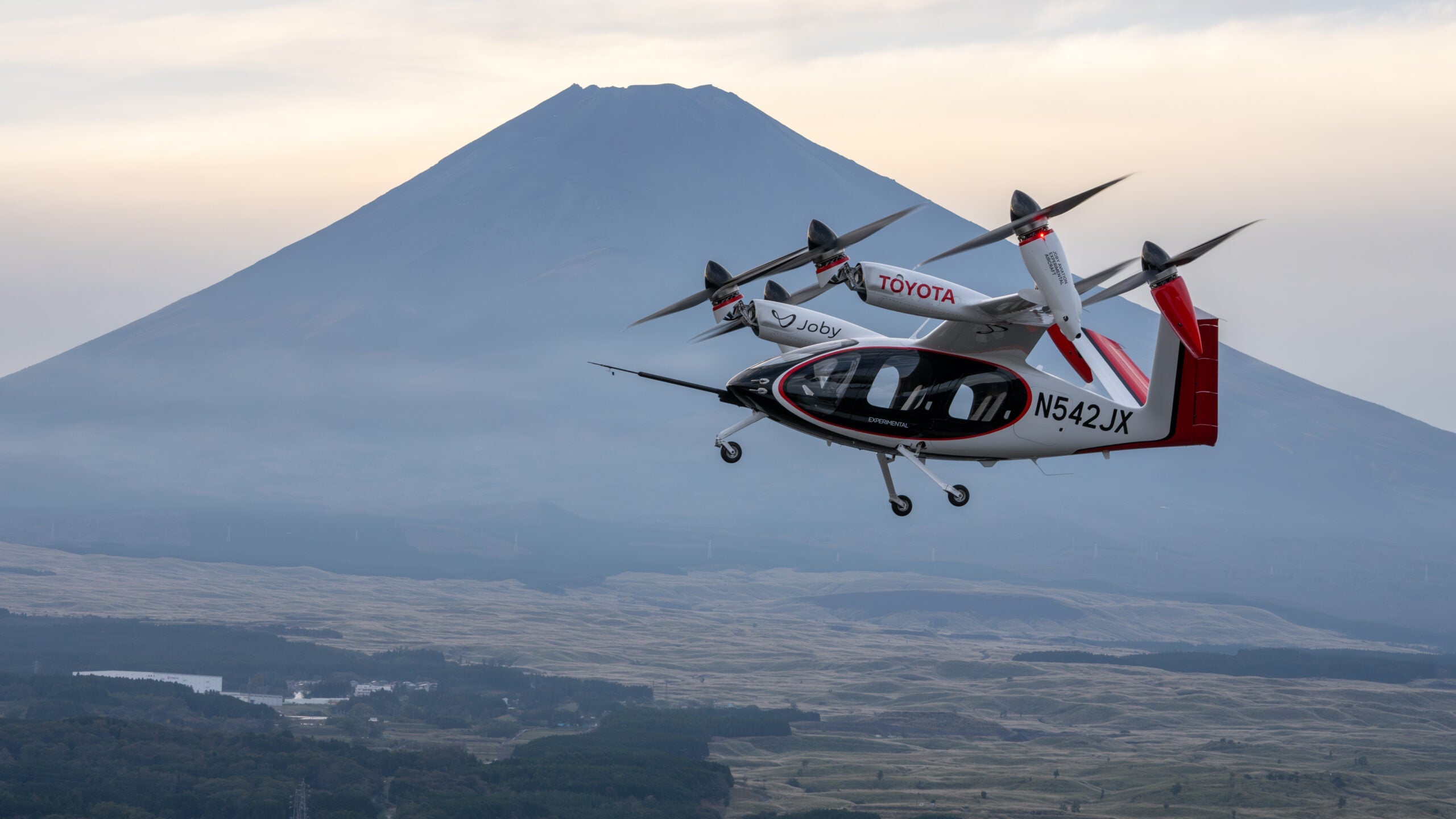 An electric vertical take-off and landing (eVTOL) passenger aircraft in flight