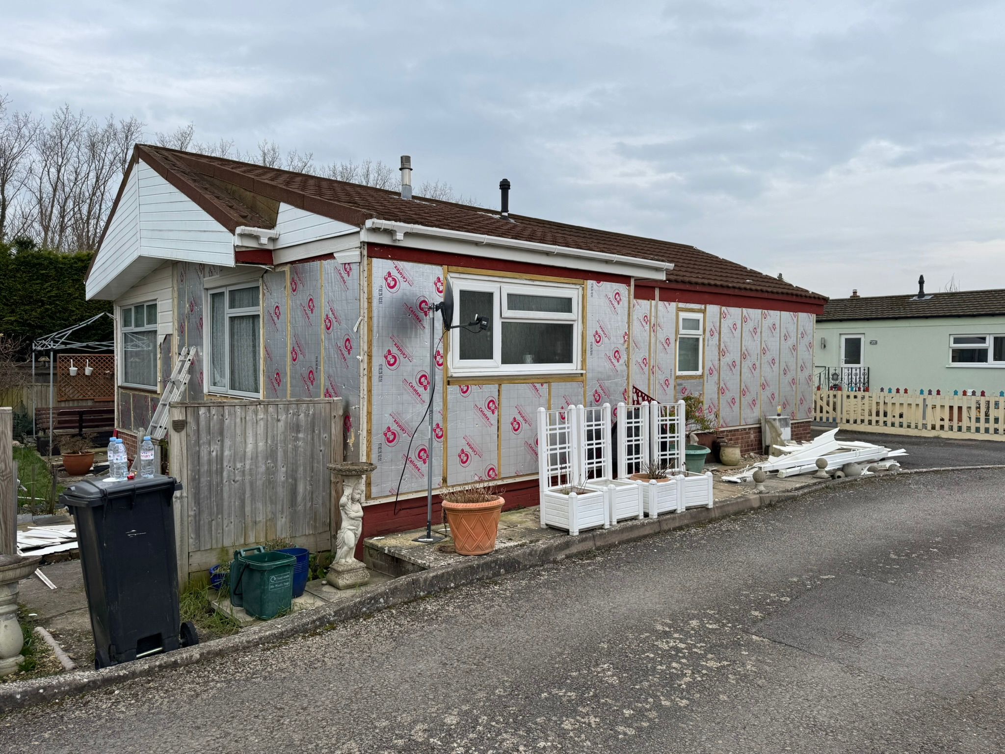 Full view of park home with Celotex insulation installation in progress
