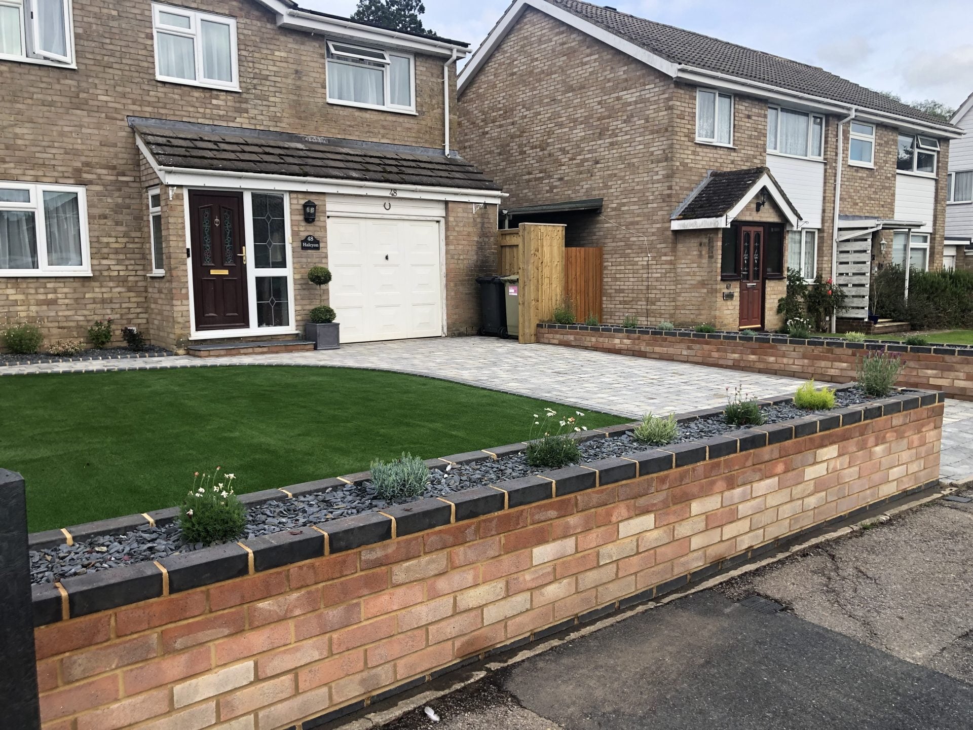 Driveway retaining wall with block paving