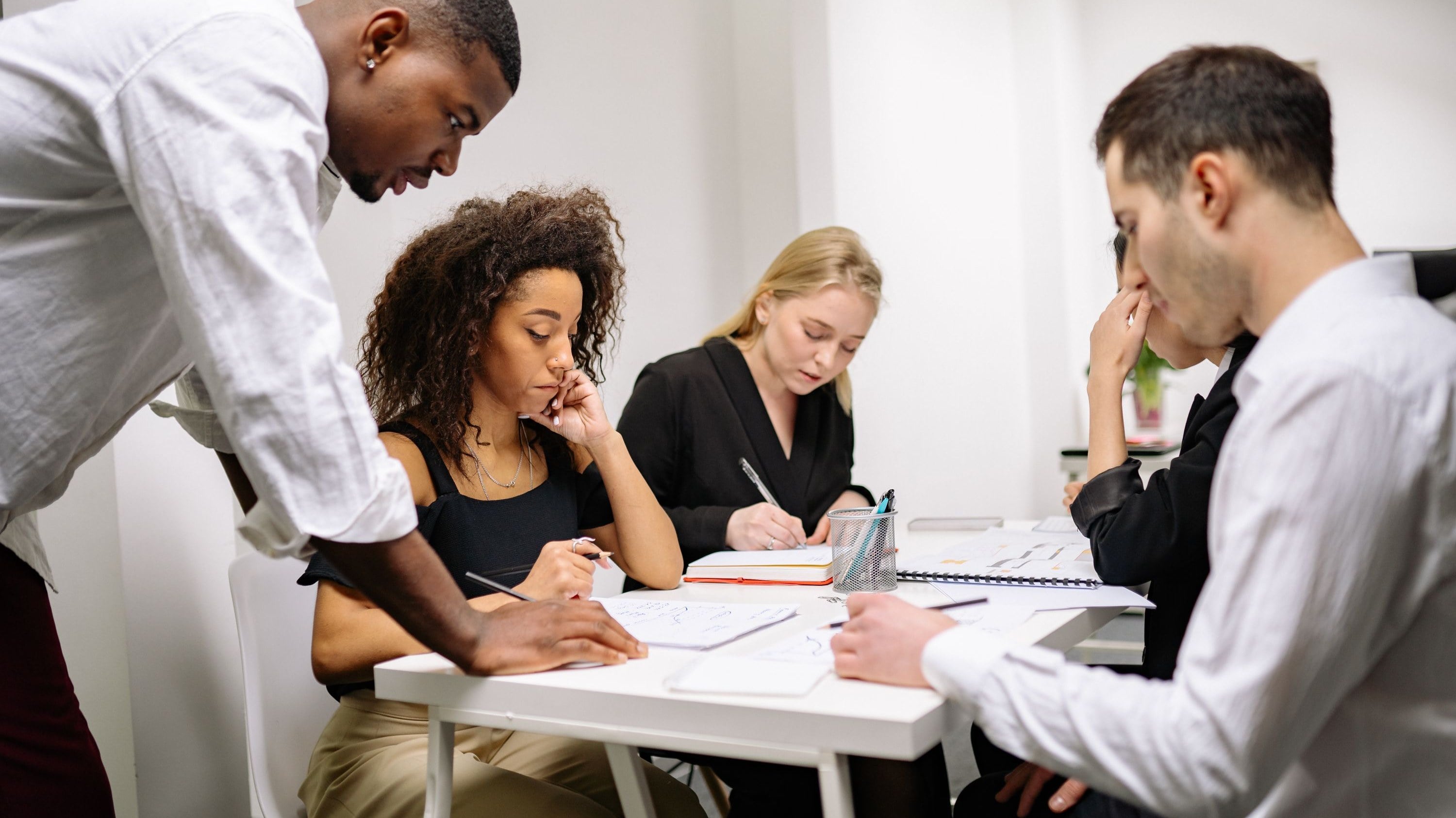 Grant writing professionals reviewing documents