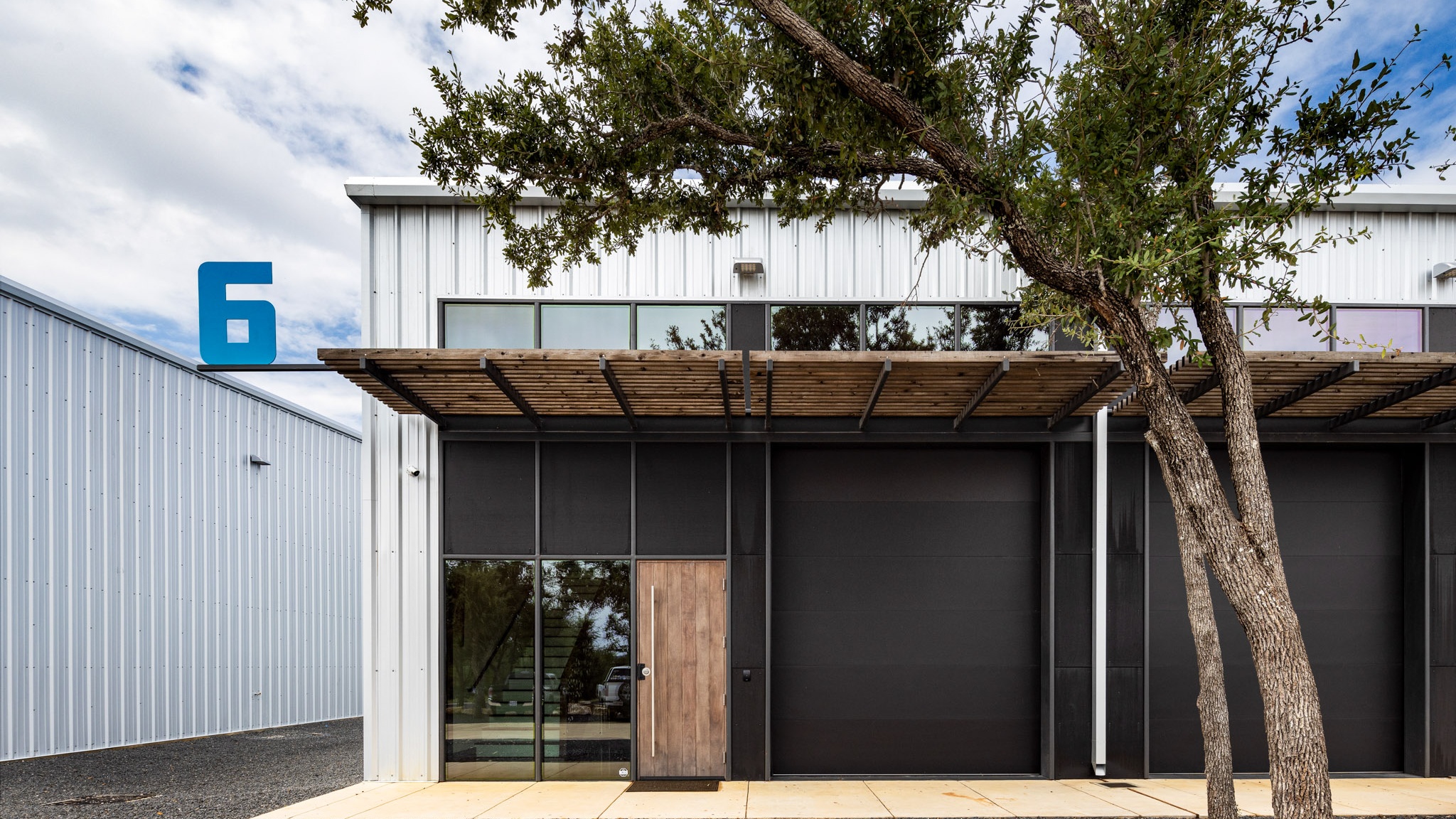Modern commercial building with a professionally maintained flat roof in the DFW metroplex