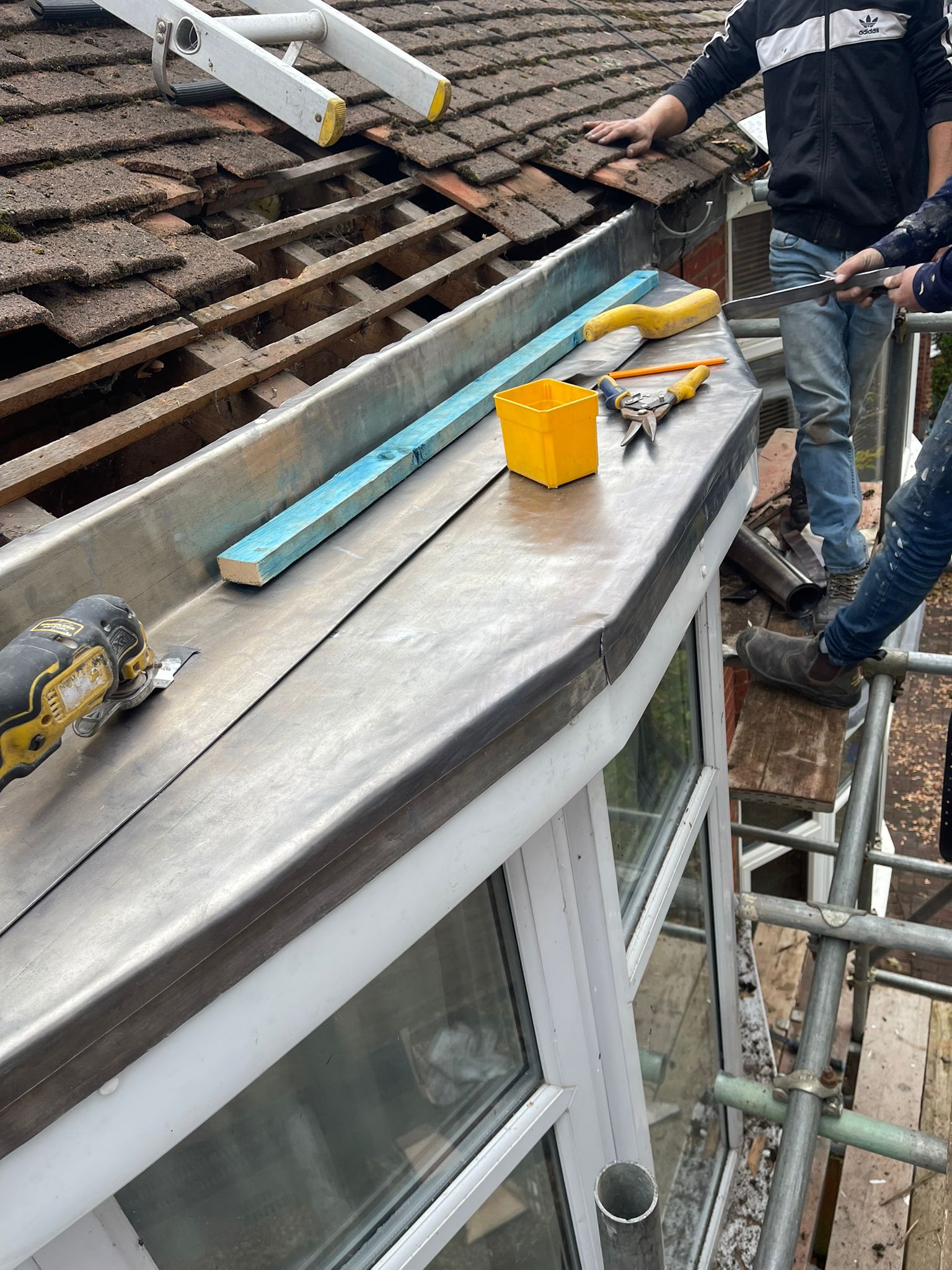 Rightway Roofing Ltd company van on-site at residential property