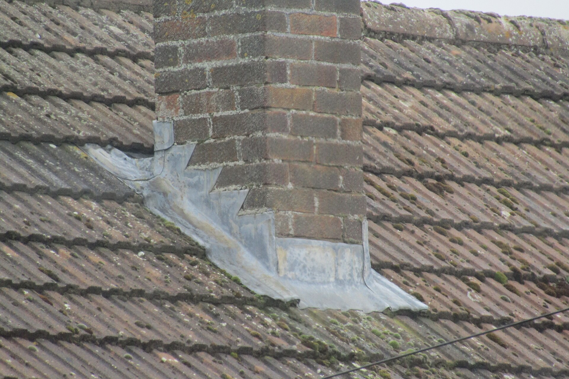 New lead flashing around a brick chimney