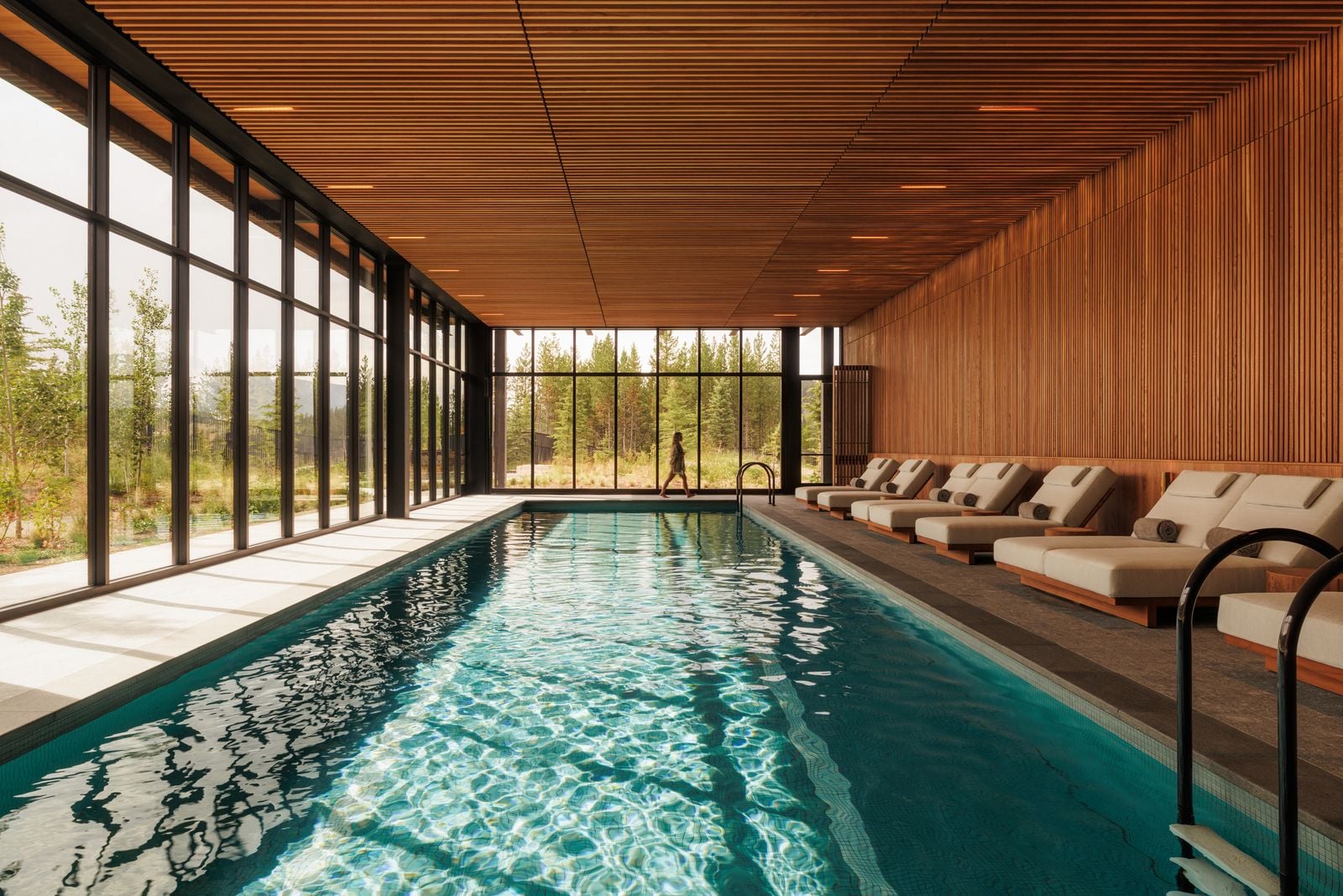 Luxury mountain wellness pool with warm lighting