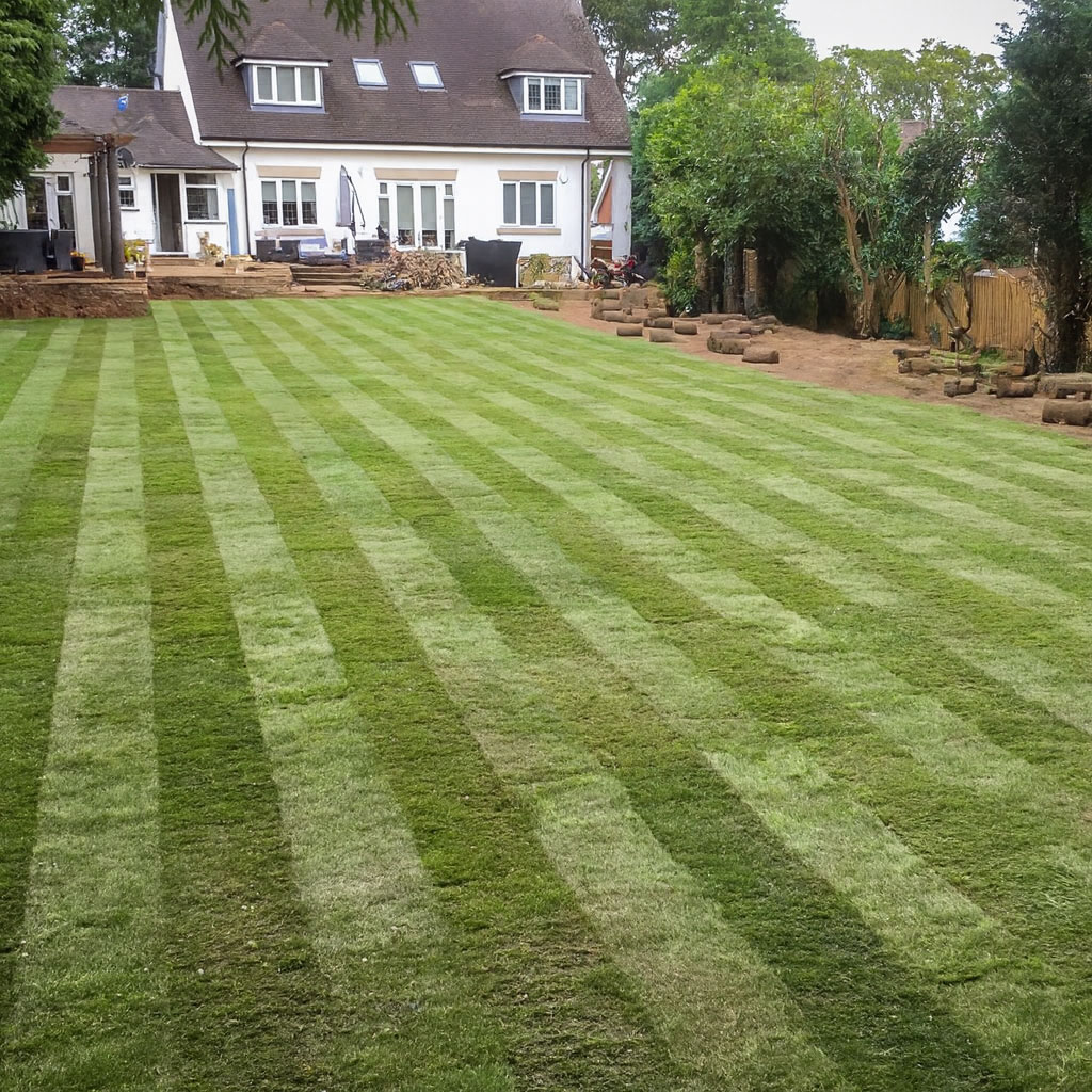 UK landscaping team working on garden project