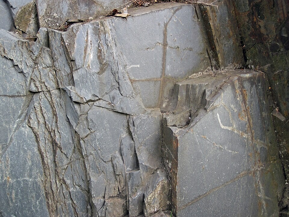 Stacked grey slate tiles