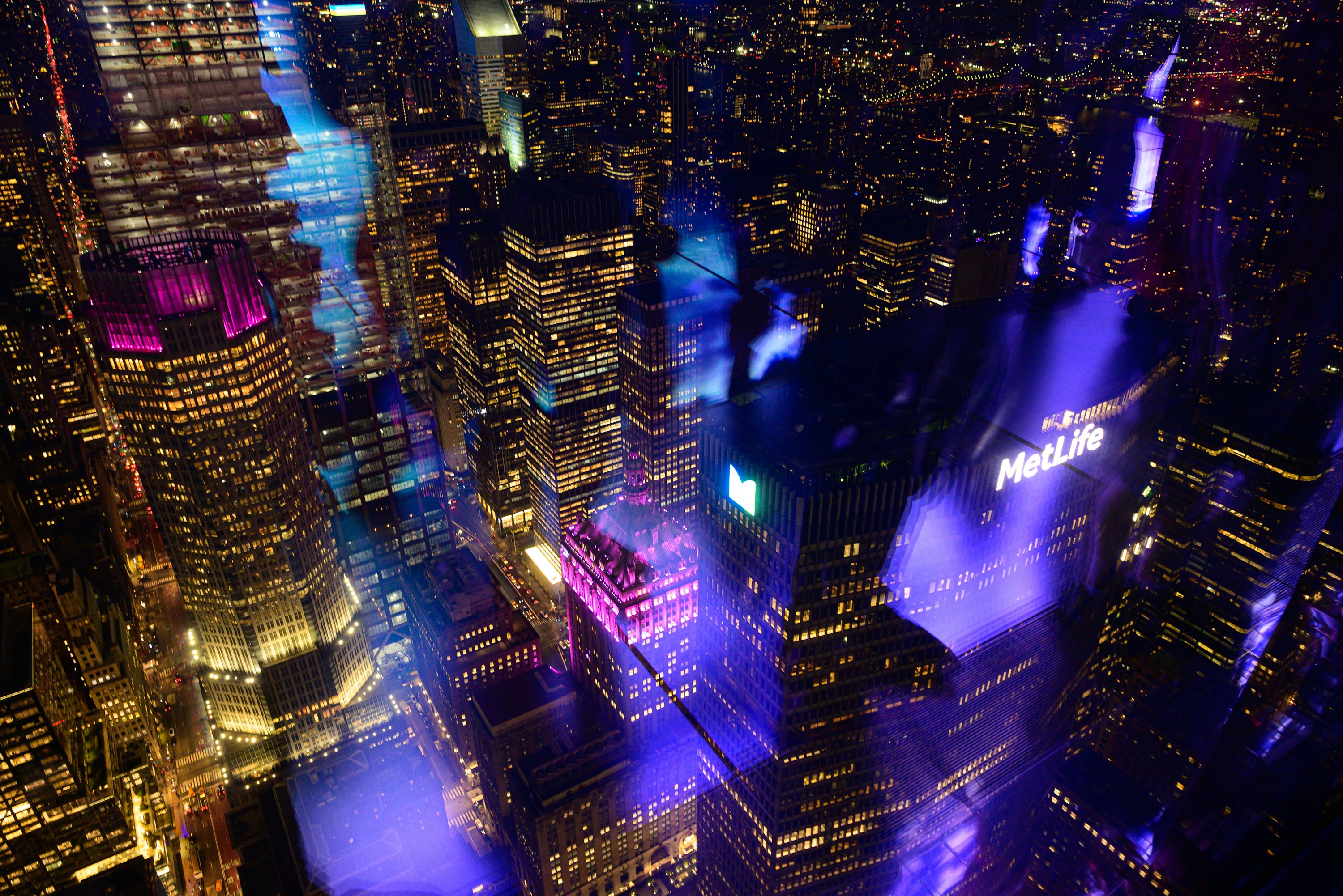 City skyline illuminated at night from above
