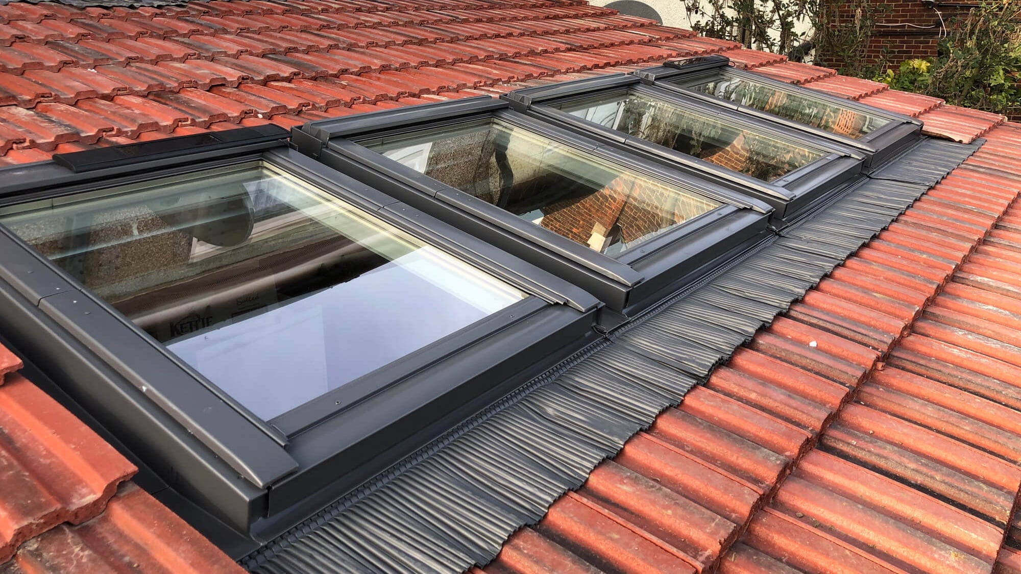 Roof with Velux skylight window installed